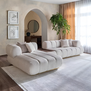 كنبة ركنية ألينورا بتصميم منحني مع شيزلونج وكونسول بدرج وقماش أوف وايت 313 سم - Home House
